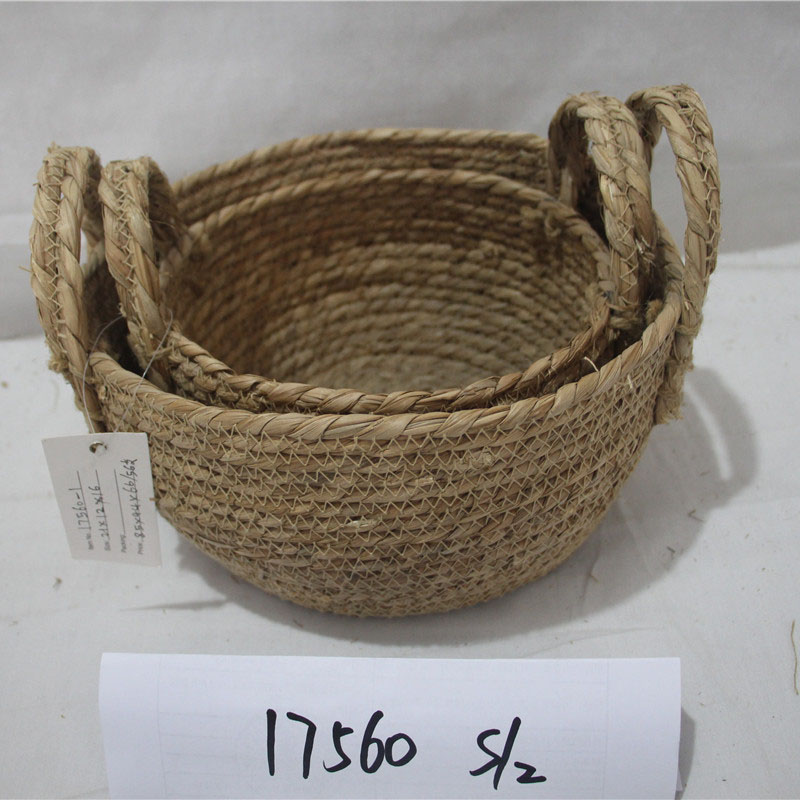 Customized wholesale belly straw basket woven seagrass natural rattan handmade storage basket with handles